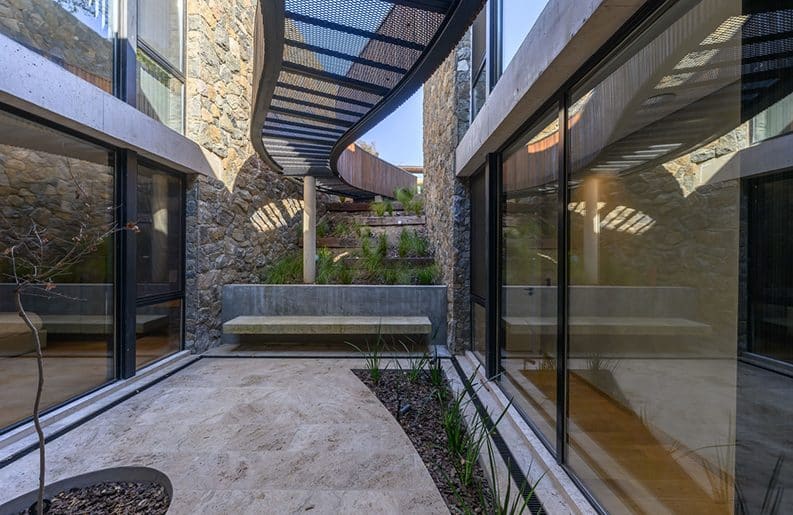 Casa Unpuente by Paolini Arquitectos
